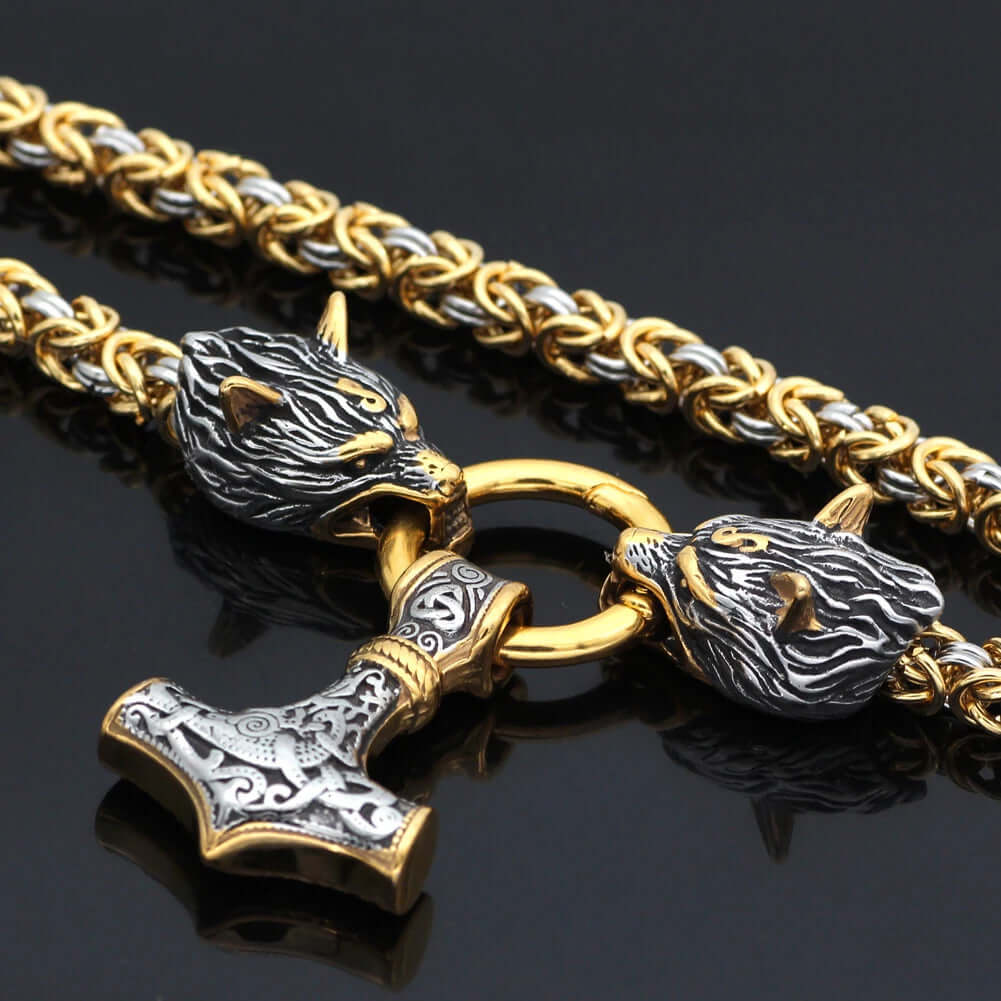 Gold-Trimmed King’s Chain with Two Wolf Heads Holding a Mjolnir Pendant