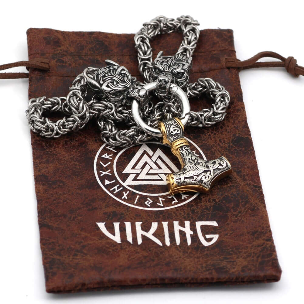 Braided King’s Chain with Two Wolf Heads Holding a Mjolnir Pendant