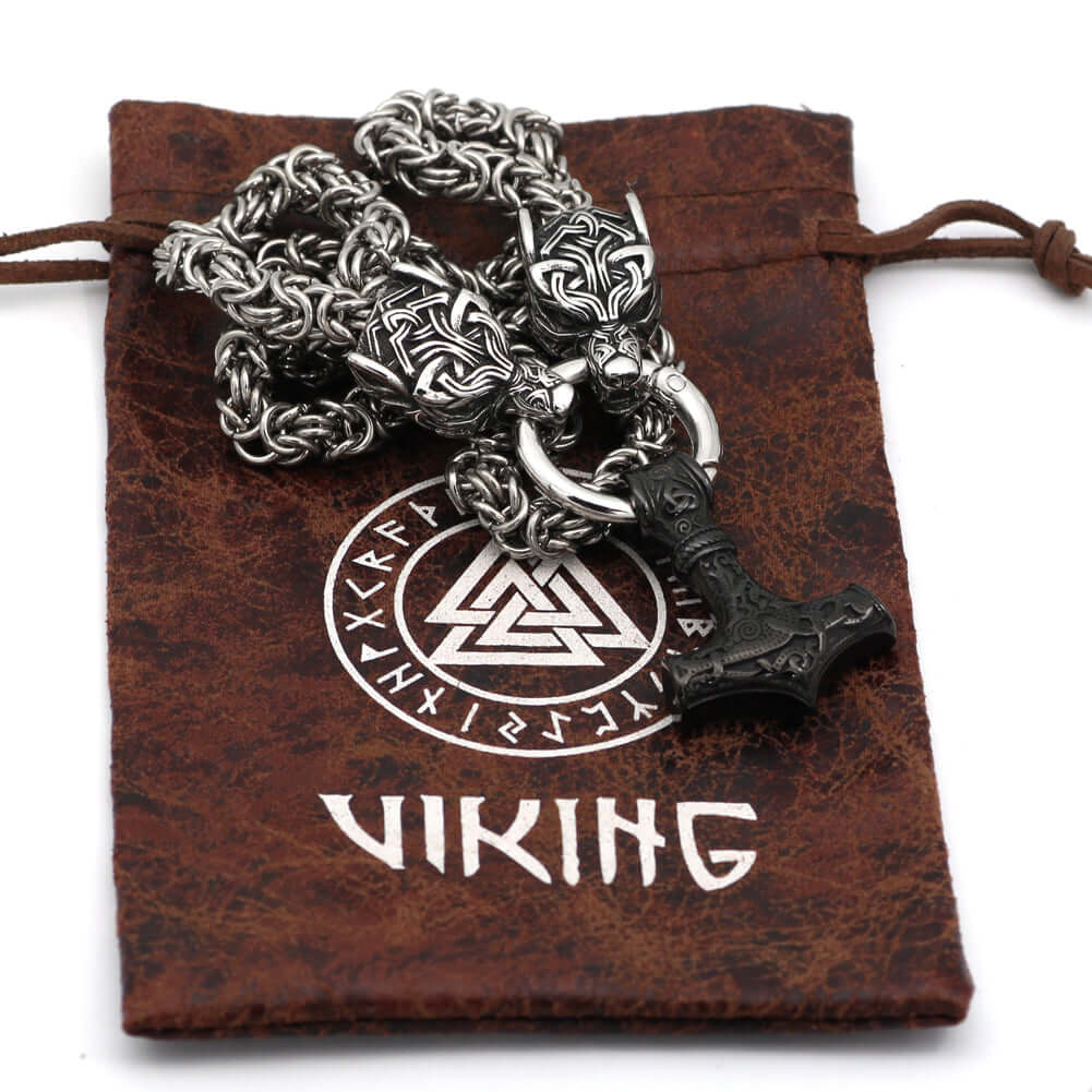 Braided King’s Chain with Two Wolf Heads Holding a Mjolnir Pendant