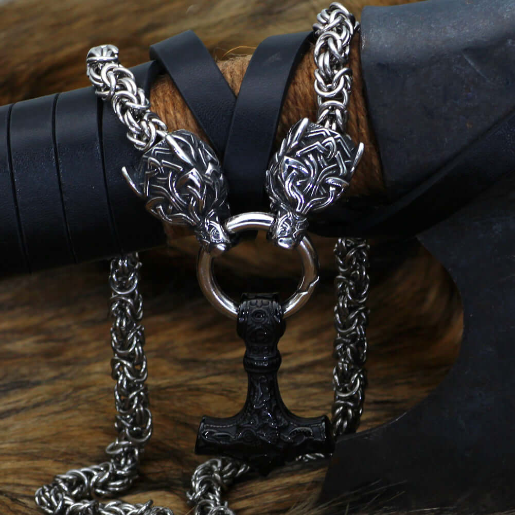 Braided King’s Chain with Two Wolf Heads Holding a Mjolnir Pendant