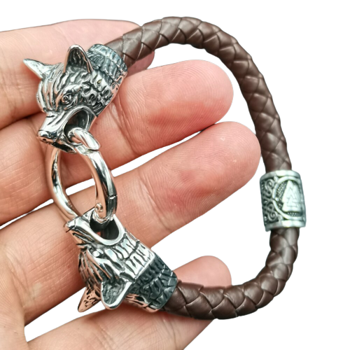 LEATHER BRACELET - WOLF HEADS AND A VALKNUT BEAD