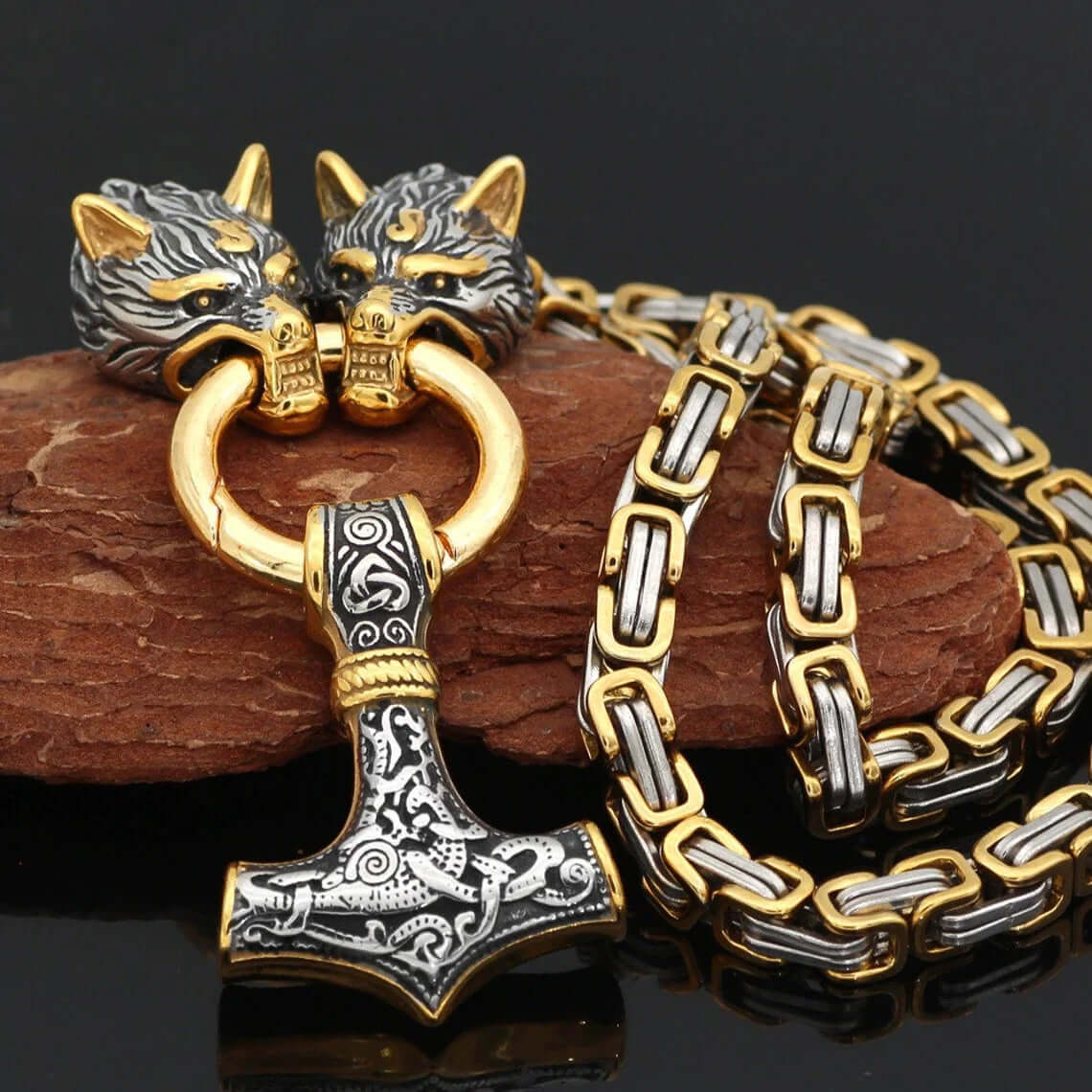 Gold-Trimmed King’s Chain with Two Wolf Heads Holding a Mjolnir Pendant