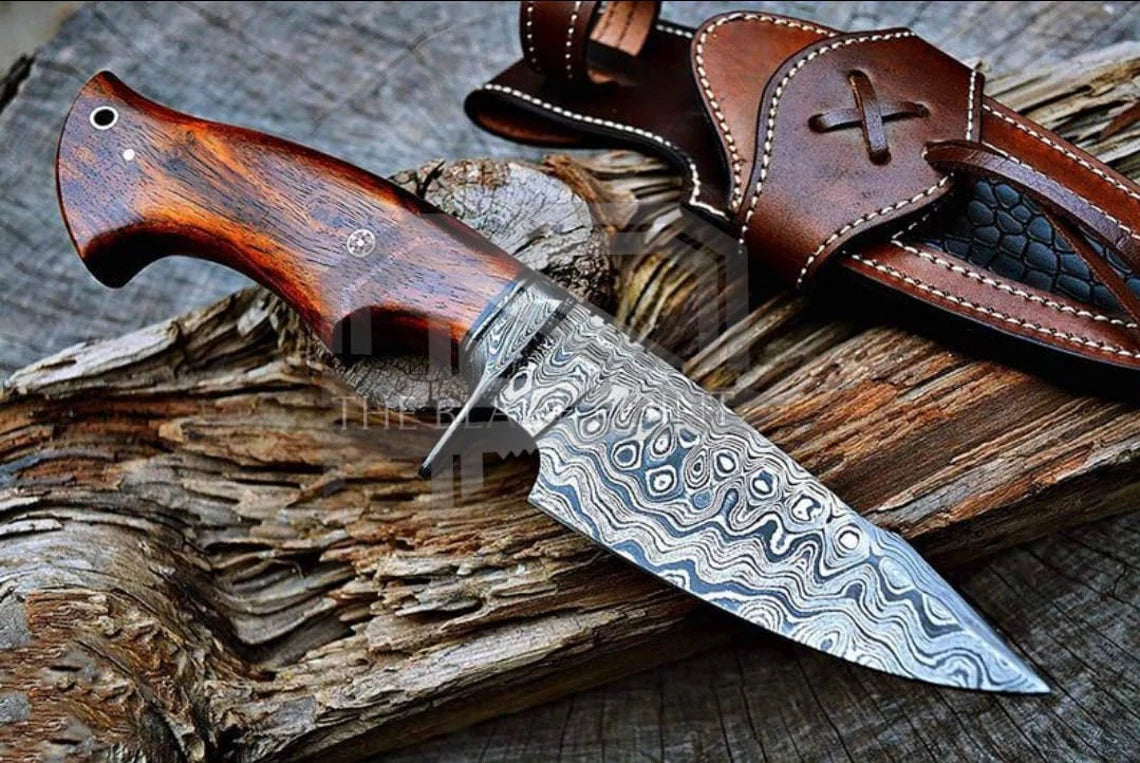 HAND-FORGED RAGNAR FIXED BLADE HUNTING KNIFE WITH PAKKA WOOD HANDLE AND LEATHER SHEATH